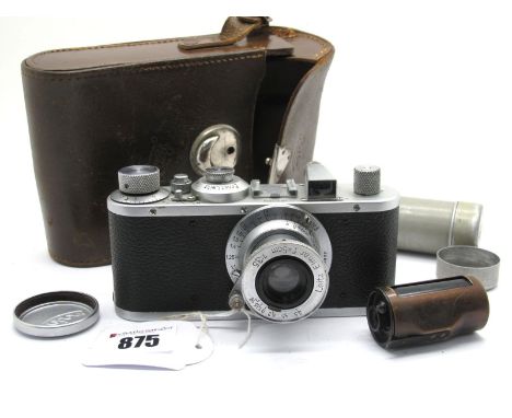 Leica No. 353834 Leitz, with Leitz Elmar f=5cm 1:3.5 Lens with Leica Cap, with two brass spools in original double container 