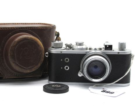 Reid Camera No P2076, with a Taylor and Hobson Anastigmat 2ins f/z lens No 328651, in a brown leather case. 