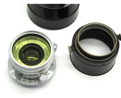 Leica Leitz Summeron 3.5cm Lens, with filter, two Leitz lens covers.