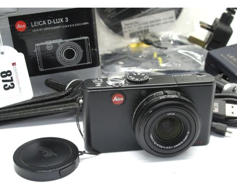 Leica D-Lux 3 With Charger, cd boxed and papers, Leitz camera stand. (2)