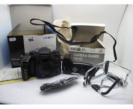 Minolta Dynax 7 Camera, 35mm and instruction manual, boxed, plus Minolta camera guard, boxed. (2)