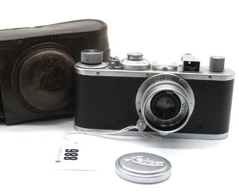 Leitz Leica Camera No 329058, with Elmar f=5cm 1:3.5 lens, in leather case.