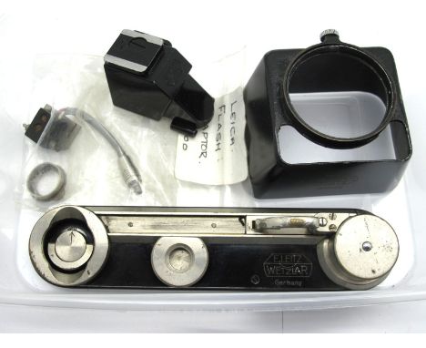 Leitz Manual Wind Camera Base, Leitz Camera Hood, Leica Flash Adaptor, Leitz View Lens.