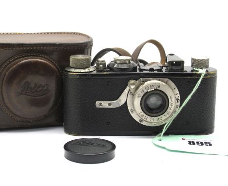 Leitz Wetzler Camera No 45273, with a Elmar 1:3.5 f=50cm lens, in brown leather case.