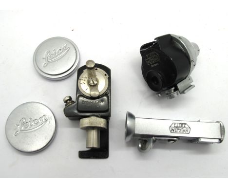 Leitz Timer, two Leica Lens Covers, Leitz View Finder and a Leitz Range Finder.