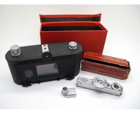 Leitz Eldia Strip Printer, in original box, Leica Leitz Fokos Wetzler in original box. 