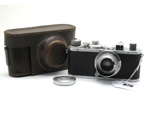 Ernst Leitz Wetler Camera, 35mm viewfinder with Elmar f=5cm 1:3,5 lens and cover with Leica cap, in brown leather case.