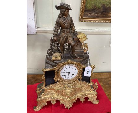Ornate gilt metal mantel clock mounted with spelter figure, 46cm high.