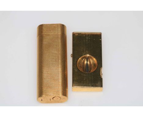 Cartier lighter, number 21880L, and cigar cutter (2).