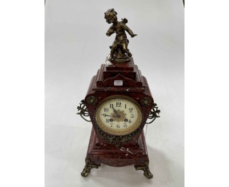 Victorian slate and brass mounted mantel clock with cherub mounted top, 46cm high.