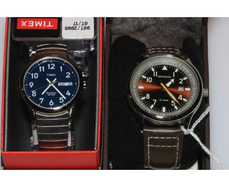 Two boxed gents Timex and Sekonda wristwatches.