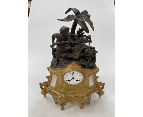 Ornate gilt metal and spelter huntsman mantel clock, 48cm high.
