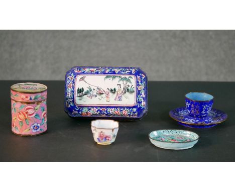 A collection of six Peking enamel pieces, including a miniature cup and saucer, a lidded box with figural design and a tea bo