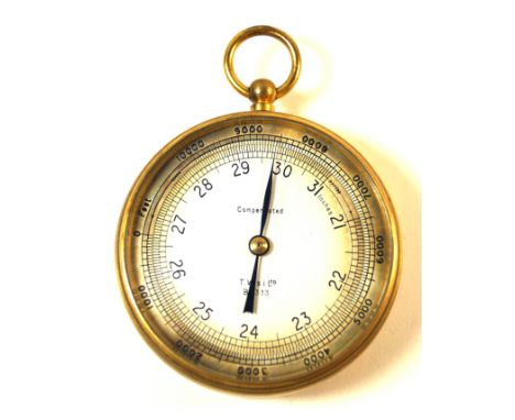 A brass cased military circular pocket barometerMarked T.W.s.i. Ltd, with military arrow to reverse, diameter 7cm, complete w
