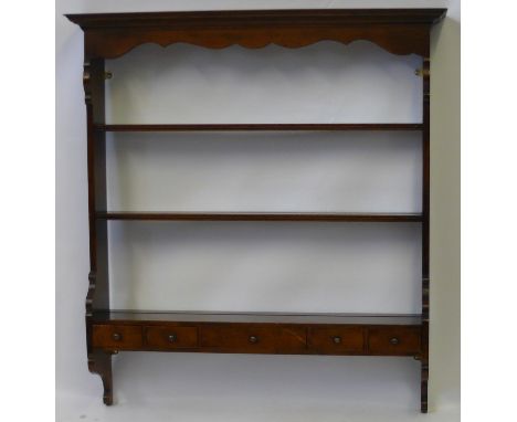 A good quality Titchmarsh & Goodwin of Ipswich period style solid oak plate rack, 20th CenturyThe shaped canopy above two fix