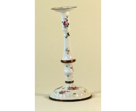 An 18th Century Bilston enamel candle holder, c.1780Having floral decoration on a white enamel ground, height 18cm