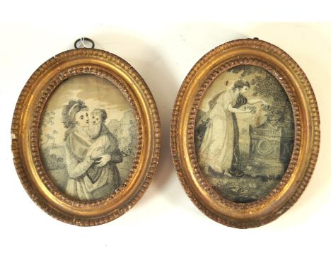 A pair of late 18th/19th century silk panels of oval formThe first depicting a mother holding child, with label verso 'Worked
