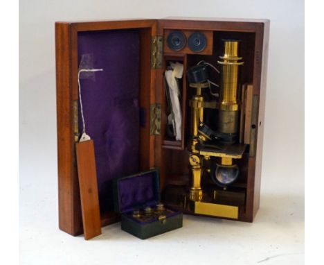 A Bryson of Edinburgh lacquered brass microscopeComplete with fitted mahogany case and extra lenses CONDITION REPORT:  Item a