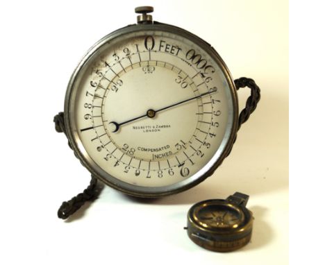 A Negretti & Zambra anemometerInset in brown leather outer case, diameter 15cm, together with a J.H. Steward brass cased pock