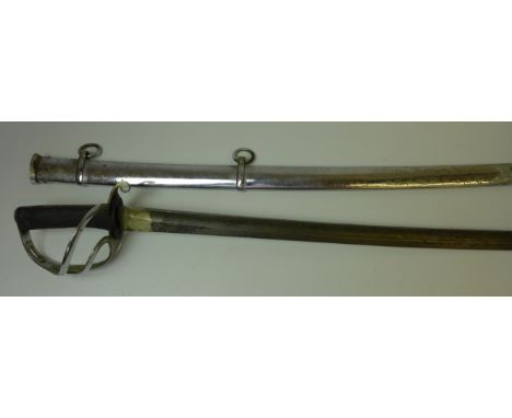 An 1853 pattern British Cavalry sword89cm single edge single fullered blade, with pierced chrome guard, leather grip, complet