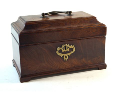 A Georgian mahogany tea caddy of plain rectangular formThe hinged cover lifts to enclose three pewter containers, raised on f