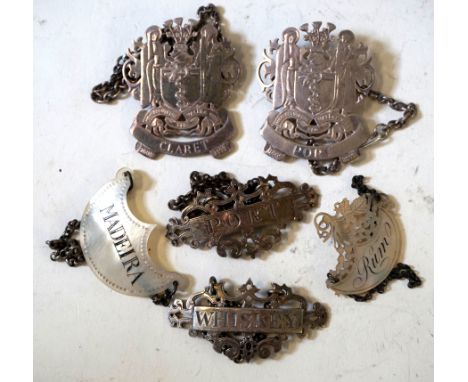 Six Victorian and later hallmarked silver and mother of pearl decanter labelsVarious shapes and patterns a pair having cast G