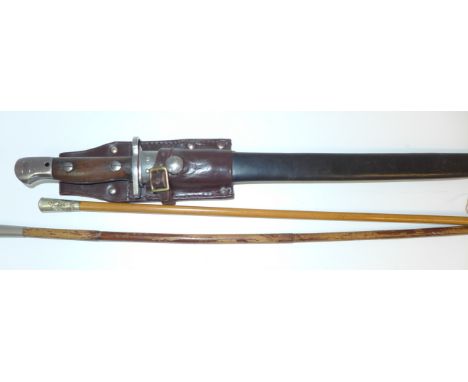 A British 1907 pattern bayonet 42.5cm blade, wooden grips, wooden grips, complete with a metal and black leather mounted scab