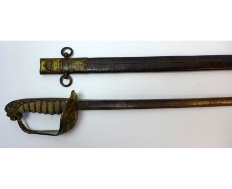 A British Naval cadets' sword, mid to late 19th Century58cm curved single edged single fullered blade with acid etched decora