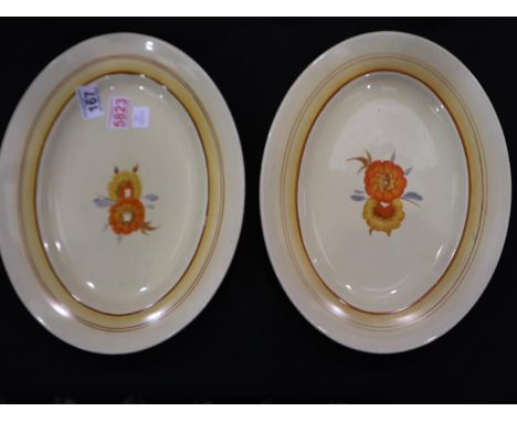 Two Clarice Cliff large oval platters with floral decoration, largest D: 36 cm. Not available for in-house P&amp;P