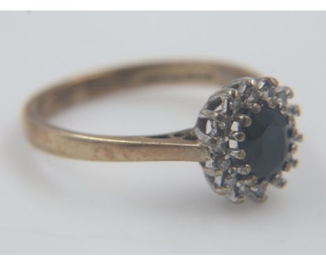 9ct gold cocktail ring set with sapphires and diamonds, size M/O, 2.4g. UK P&amp;P Group 0 (£6+VAT for the first lot and £1+V