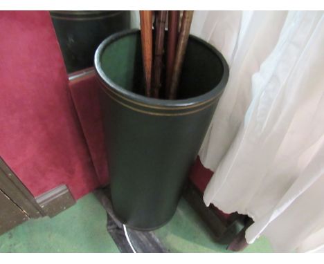 A green leather cylindrical stick stand with gilt leaf decoration and internal drip tray, 60cm high 