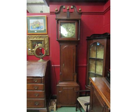 A 19th Century Kighly oak longcase clock, brass numerated dial and face, scroll top with brass ball finials, pendulum and wei