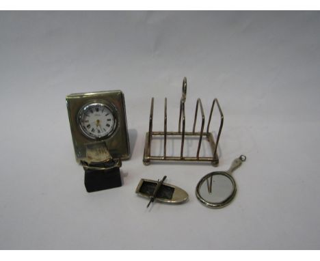 A silver miniature toast rack, Carr silver framed clock, two boat models and a miniature hand mirror (5) 