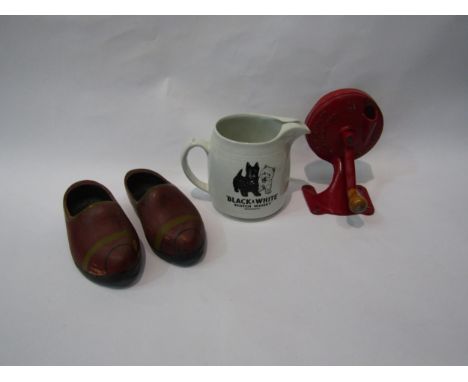 A bygone Spong and Co. Ltd Bean Slicer, Burleighware Black &amp; White Scotch Whisky jug and a pair of painted child's clogs 