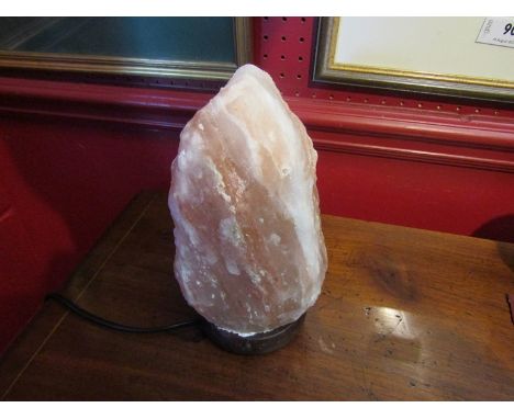 A Himalayan salt lamp, 24cm tall 