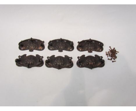 A set of six Art Nouveau copper drawer handle plates 