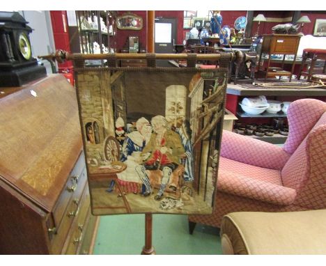 A Victorian walnut pole screen on carved cabriole tripod base with a needlepoint tapestry screen, 163cm high 