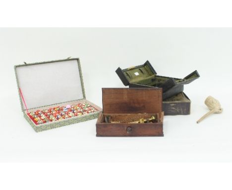 A mahogany cased balance scale, marked Oertling, London, with various weights, 25cm wide, a leather cased dressing case by J 