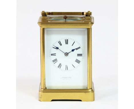 A gilt brass hour-repeat carriage clock, the white enamel dial with Roman numerals, retailed by Drew & Sons, Piccadilly Circu