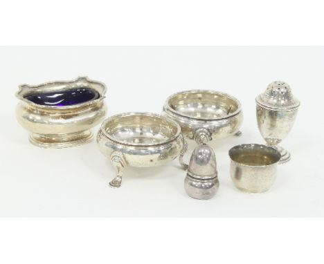 A pair of silver salts, RH, London 1862, of compressed circular form on two stepped feet, a salt of acorn form and sundry cru