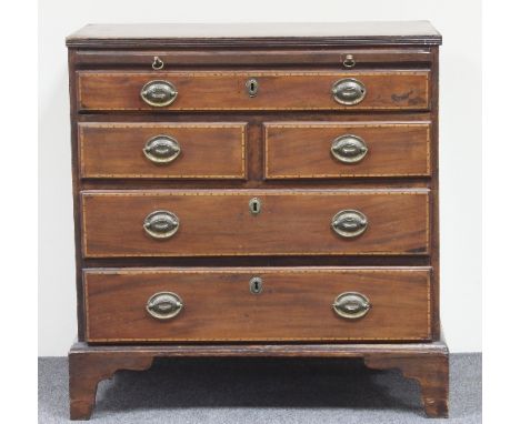 A George III mahogany chest, fitted a brushing slide and arrangement of three long and two short drawers, with cable banded f
