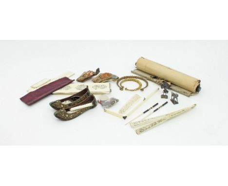 A Cantonese ivory box (damaged), 24cm wide, a pair of small Chinese shoes with gold thread decoration, a Cantonese fan (damag
