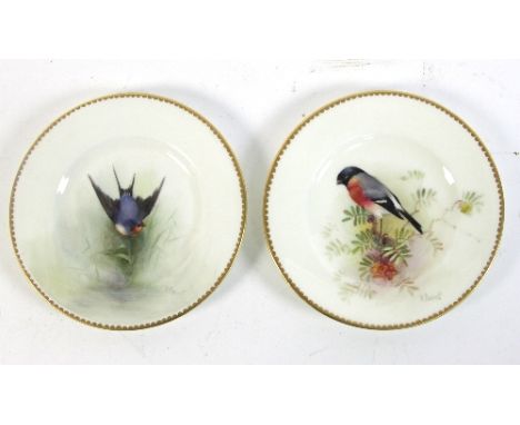 Two Royal Worcester saucers depicting birds, bullfinch and swallow, decorated by W Powell circa 1920, 12cm (4.75") diameter C