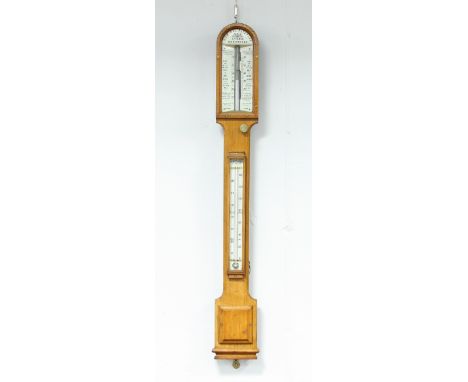 An Admiral Fitzroy's Storm barometer and thermometer in an oak case Condition Report: Good condition, case a good colour and 