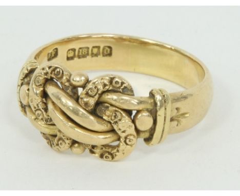 An 18ct gold ring, with knot of rope design, ring size T, approximately 9gm