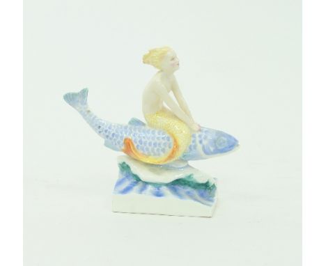 A Royal Worcester figure of a Mermaid, modelled by Anne Acheson, the mermaid modelled seated on a fish, 13.5cm high Condition