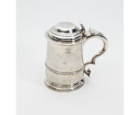 A George II silver tankard, William Darker, London 1730, engraved an armorial and motto "Ver non Semper Floret", 19.5cm high,