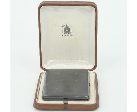 An Italian gem set cigarette case with later fitted interior, the rectangular case set with small rubies and diamonds, marked