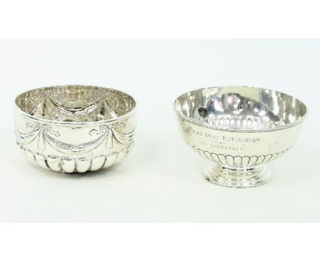 A George IV silver bowl, Sheffield 1822, of circular form with swagged decoration above a band of gadrooning, 10cm diameter a