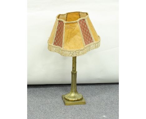 A 19th Century brass lappet chased lamp (now fitted for electricity), 46cm high